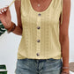 Laza szabású, egyszínű, V-nyakú mellény