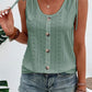 Laza szabású, egyszínű, V-nyakú mellény